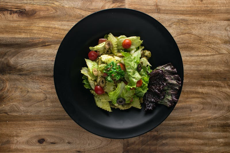 Chopped Italian salad with salami and olives